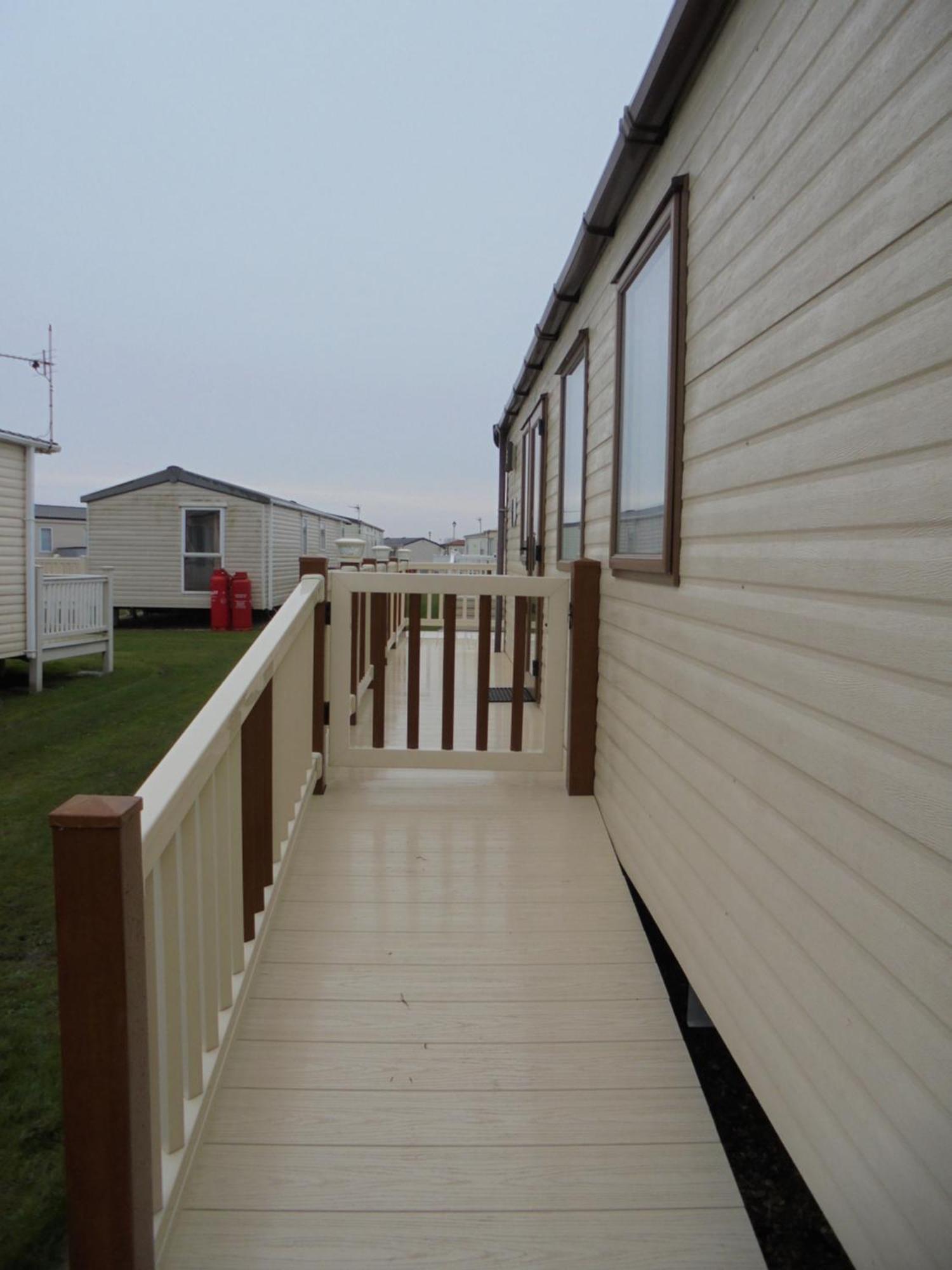 Holiday home The Grange Ingoldmells: Elan 6 Berth, Heated, Wrap Around Decking *